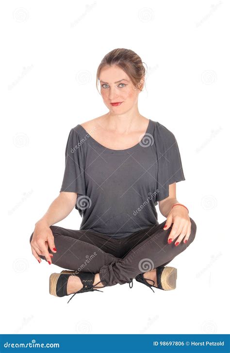 Woman Sitting With Legs Crossed On Floor Stock Photo Image Of Gray
