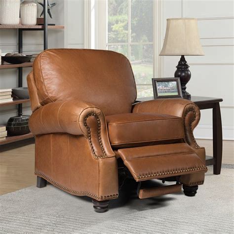 So, we decided to take a look into this world of comfortable seating to see if any designer had managed to develop a reclining lounge chair worthy. Kevan Leather Recliner in 2020 | Swivel recliner chairs ...