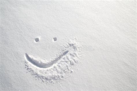 Face Happy Smiley Drawn On White Snow Frosty Winter Day Stock Photo