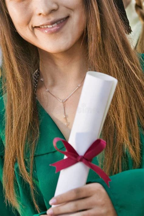 Cropped Photo Of College Graduate Holding Diploma Stock Photo Image