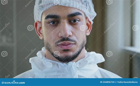 Portrait Of Exhausted Tired Young Arab Male Doctor Nurse Practitioner