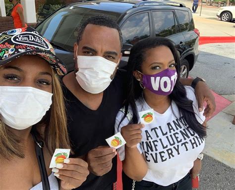 Celebs Out And About Kandi Burruss And Todd Tucker Vote Amina Buddafly