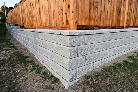 Should You Add A Fence To A Retaining Wall And How To Do So