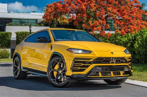 Last year, ferrari boss sergio marchionne said someone would have to shoot him before he'd approve the development of a suv with a yellow prancing horse emblem on the hood. Rent Lamborghini URUS Yellow in Miami - Pugachev Luxury Car Rental