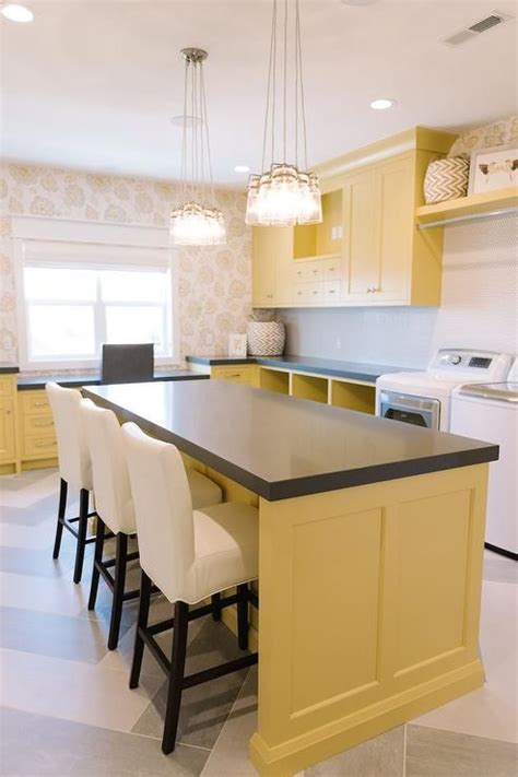 The floor plan shows how each room is laid out on each floor of the house. Yellow Laundry Room Cabinets with Gray Quartz Countertops ...