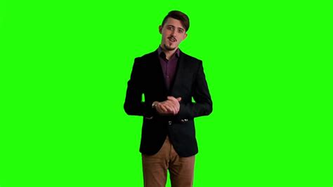 Portrait Of Young Man Standing Against Green Screen Male Person People