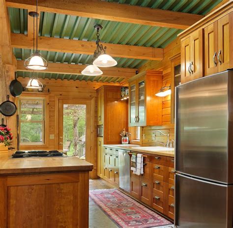 Darker red tile forms the countertops, and if you notice, brightly colored tiles give an unexpected pop of color. Homegazing Straw-bale home in North Branch | Kitchen ...
