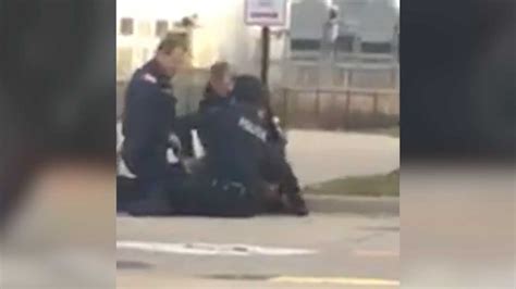 Video Shows Officer Punching Robbery Suspect