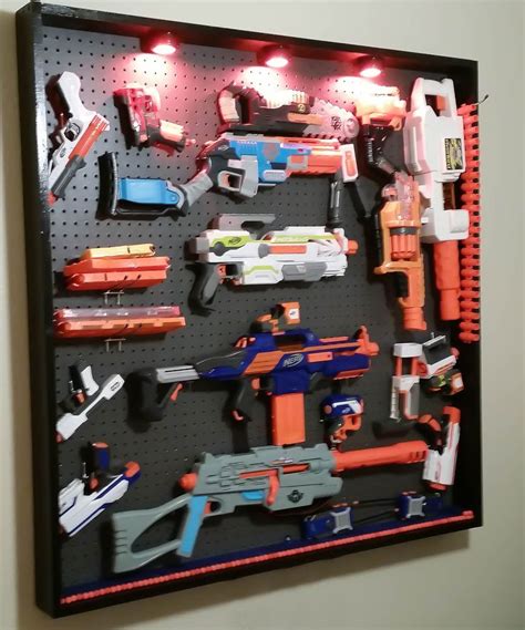Attach 2 hooks spaced about the same. Nerf Gun Rack Wall Mounted - DIY Nerf gun rack- used a ...