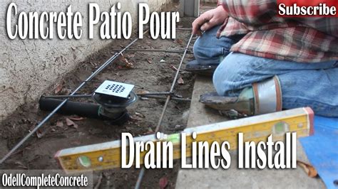 Draining that area into the frenchdrain area is not really good because the surface collection area of the drain area is in direct contact with the house wall the patio seem to had been designed to drain the water on the north west corner, however there is nothing like a drain or like a channel there. How to Pour a Concrete Backyard Patio and Install Drains ...