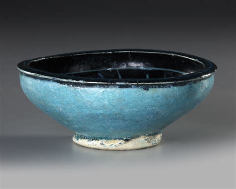 A Black And Turquoise Glazed Kashan Bowl Persia 13th Century