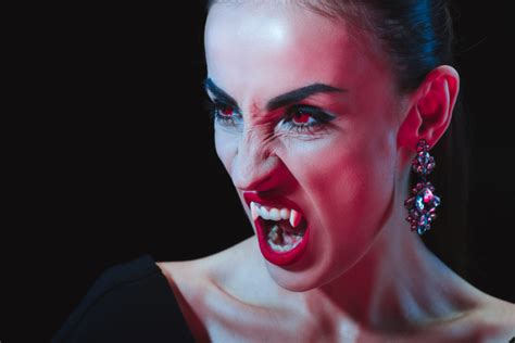 Dreadful Vampire Showing Her Fangs And Looking Free Stock Photo And Image