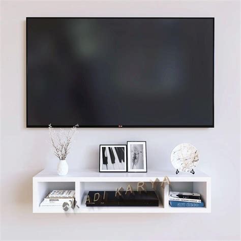 Desain rak tv minimalis yang ringan , sederhana, dengan pajangan seperlunya memberi kesan anggun , modern dan trendy. Rak Tv Dinding Minimalis Dekorasi Meja Gantung Susun ...