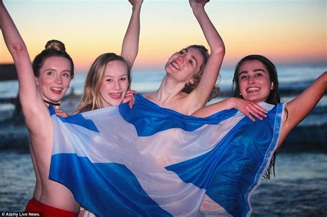 Students Strip Off To Celebrate May Day With Traditional Dawn Swim
