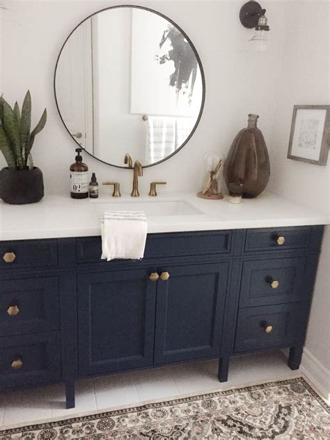 Perfect for a powder rooms or guest baths, 24 inch vanities will only remember, the vanity tops, hardware, and accessories all combine to create the overall look black is timeless, versatile, flexible and virtually always in. Navy vanity with gold hardware and gold faucet. - Karin ...