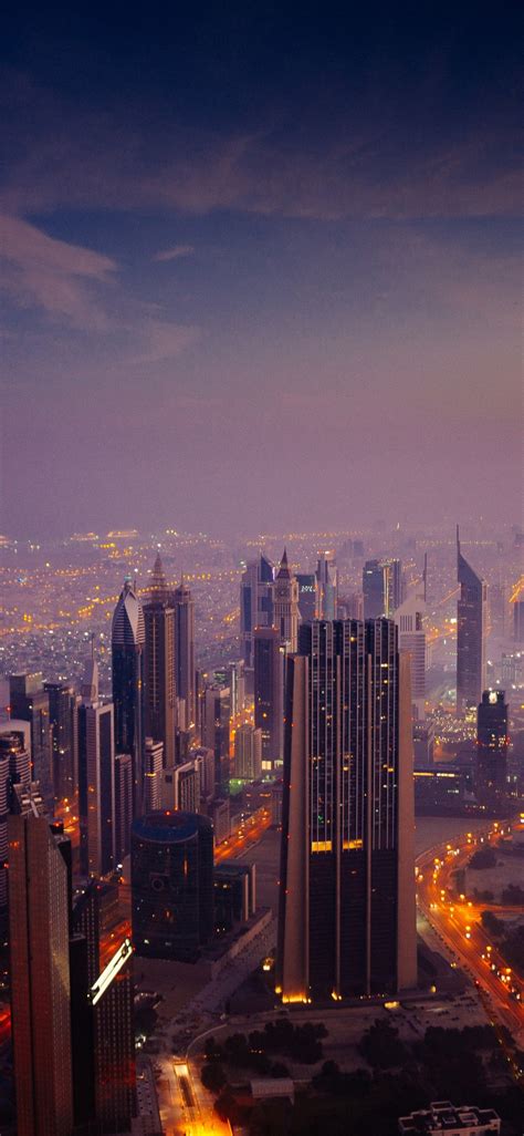 Download Wallpaper 1125x2436 Cityscape Dubai At Night Buildings Sky