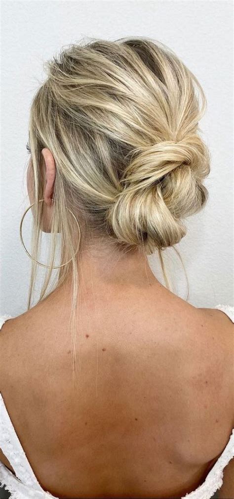 75 trendiest updo hairstyles 2021 twisted and knot bun for fine straight hair