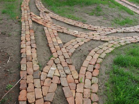 However, these materials do not always offer as a long. Reclaimed brick garden path under constructions | Brick ...