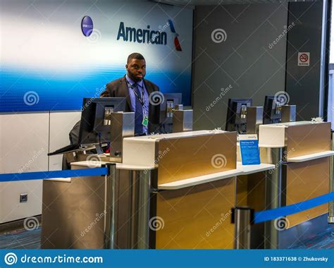 American Airlines Agent At The Gate At O`hare International Airport In