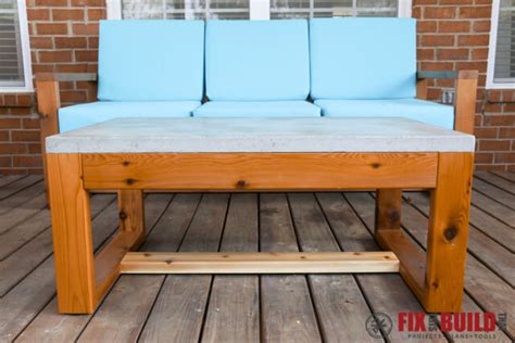 Made for indoor or outdoor spaces, it is the perfect piece to help ground your space. DIY Concrete Top Outdoor Coffee Table | FixThisBuildThat