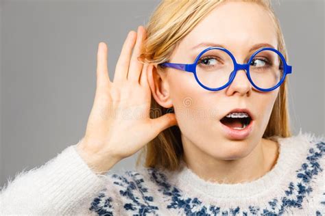 Woman Listening Carefully With Hand Close To Ear Stock Image Image Of