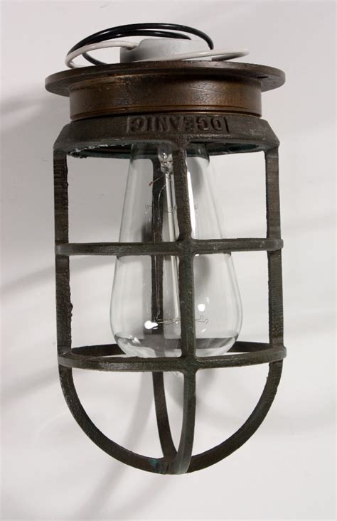 Industrial ceiling lighting that will add industrial style to any room. Antique Industrial Cast Bronze Cage Light Fixture for Wall ...