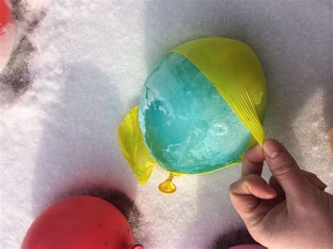 Making Frozen Colored Water Balloons As A Cure To The Winter Blues