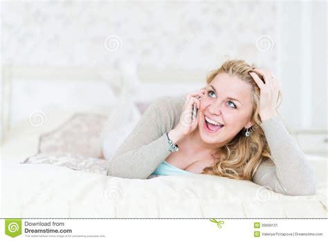 Blonde Lying On Bed And Phoning Stock Image Image Of Adult