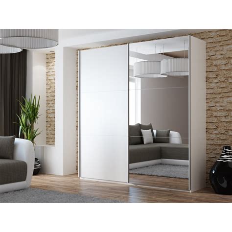 There are a wide range of options when it comes to choosing the design of your bedroom. (White, 200 cm) Sliding door wardrobe with mirror VIGO on ...