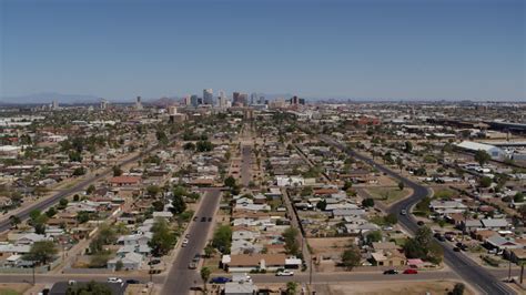 57k Stock Footage Aerial Video Of A Wide View Of Urban Neighborhoods And The Citys Skyline In