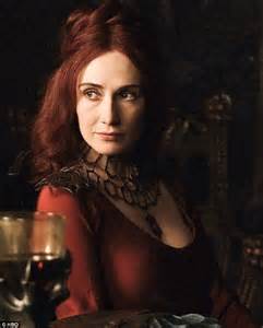 Game Of Thrones S Emilia Clarke Channels Melisandre In Sizzling Scarlet