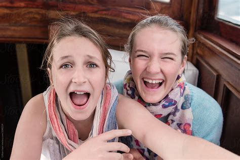 Two Teen Girls Laughing Together By Stocksy Contributor Gillian Vann Stocksy