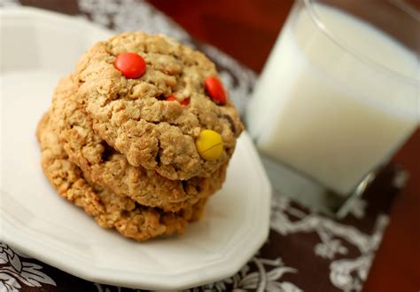 Using a rubber spatula, stir in the flour, baking soda and salt. Chewy Reese's Pieces Peanut Butter Oatmeal Cookies - A ...