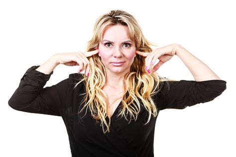 Blonde Woman Plug Ears Stock Photo Download Image Now Adult Advice