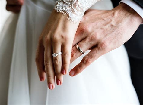 Bride And Groom Showing Their Engagement Wedding Rings On Hands Premium Image By