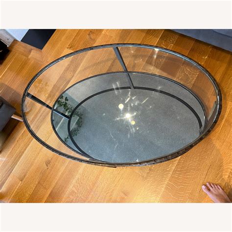 Crate & Barrell Clairemont Oval Glass Coffee Table - AptDeco