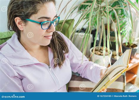 Young Pretty Girl Reads A Book Stock Image Image Of Comfortable