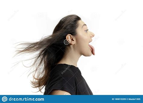 Smiling Girl Opening Her Mouth And Showing The Long Big Giant Tongue