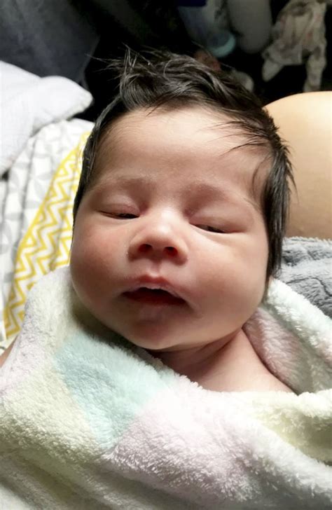 Midwives Shocked As Newborn Baby Is Born With A Full Head Of Hair