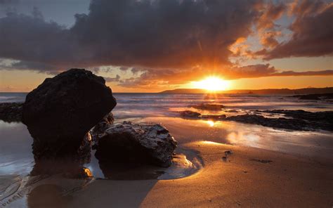 Beach Sunset Landscape Between Rocks