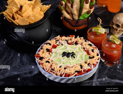 Spooky Halloween Seven Layer Taco Dip Turn A Classic Appetizer Into A