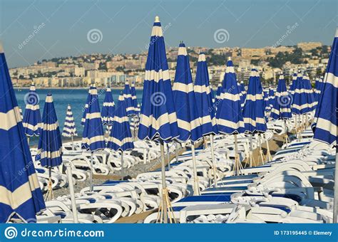 Umbrellas On Empty Beach In Nice France Stock Image Image Of