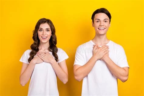 Photo Portrait Of Excited Surprised Brother With Sister Shocked Unexpected Hands Chest Thankful