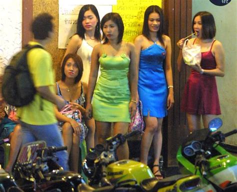 Young Thai Prostitutes Stand In Front Of A Bar Wai Pictures Getty Images