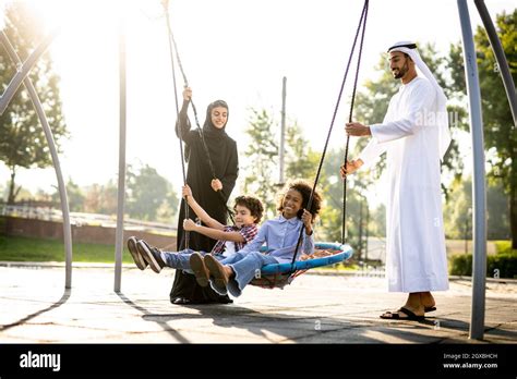 Cinematic image of a family playing at the playground in Dubai Stock