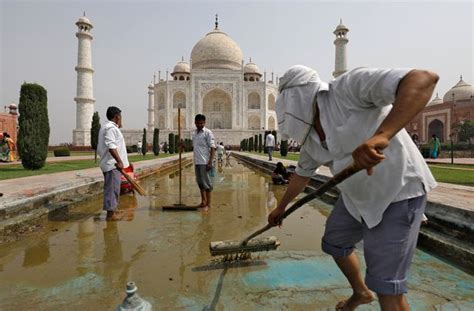 Indias White Marble Taj Mahal Is Turning Green Due To Filthy City Air