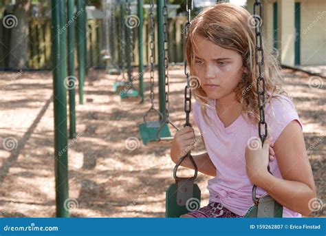 Sad Girl Sitting Alone On A Playground Swing Stock Image Image Of Health Lonely 159262807
