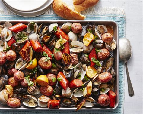 Photo by david malosh, food styling by rebecca jurkevich, prop styling by cindy diprima. Sheet Pan Seafood Bake with Buttery Wine Sauce Recipe ...