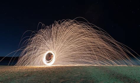Steel Wool Fire Twirling Photograph By Merrillie Redden Fine Art America