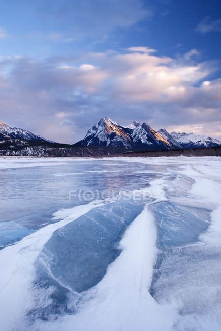 Frozen Abraham Lake In Winter With Mount Ex Coelis Bighorn Wildland